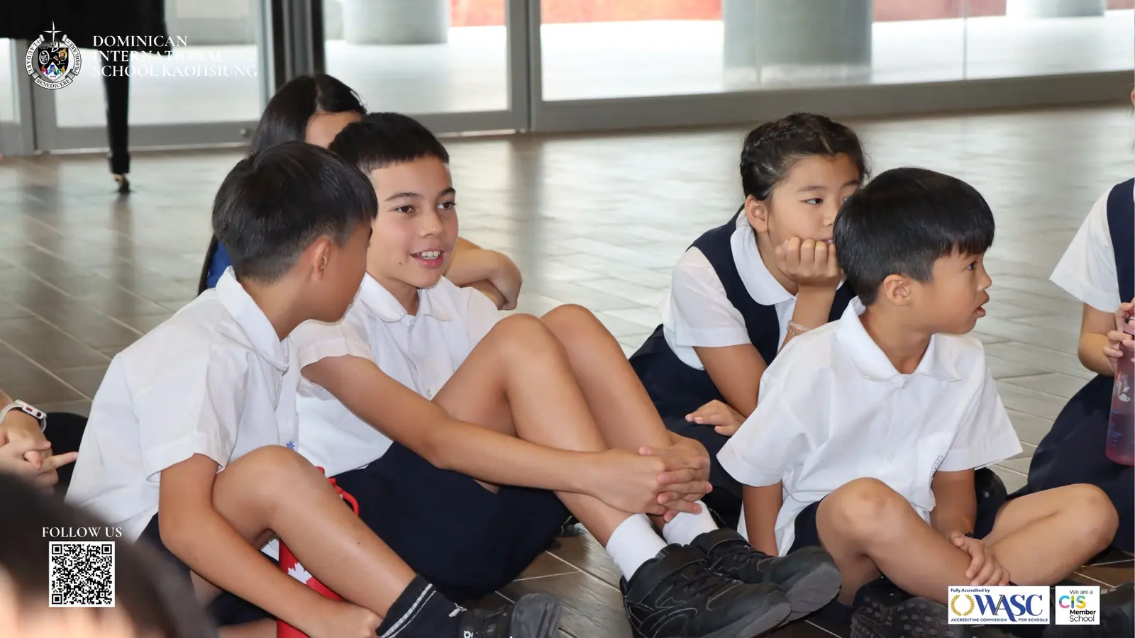 DISK students seated together during a back-to-school welcome activity