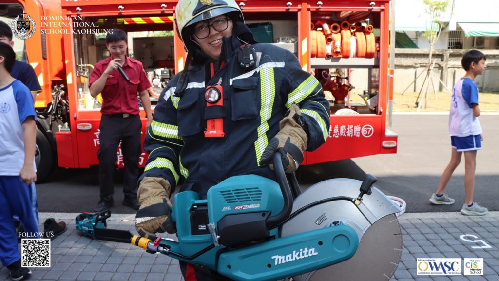 DISK Fire Drill and Fire Safety Activity with local firefighters, photograph 6 of 10