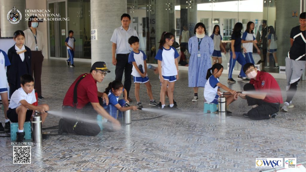 DISK Fire Drill and Fire Safety Activity with local firefighters, photograph 9 of 10